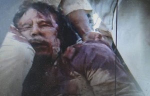 A verdadeira noticia sobre a morte de Kaddafi contada pela Agencia Internacional Reuters : Gaddafi é capturado e morto em sua cidade natal na Líbia kaddafi morto